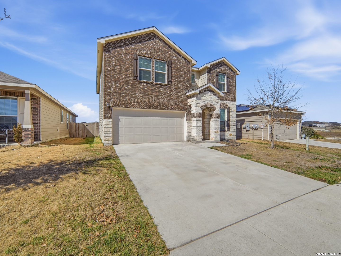 308 Autumn Rouge New Braunfels, TX 78130 - Photo 1 of 15 a front view of a house with a yard