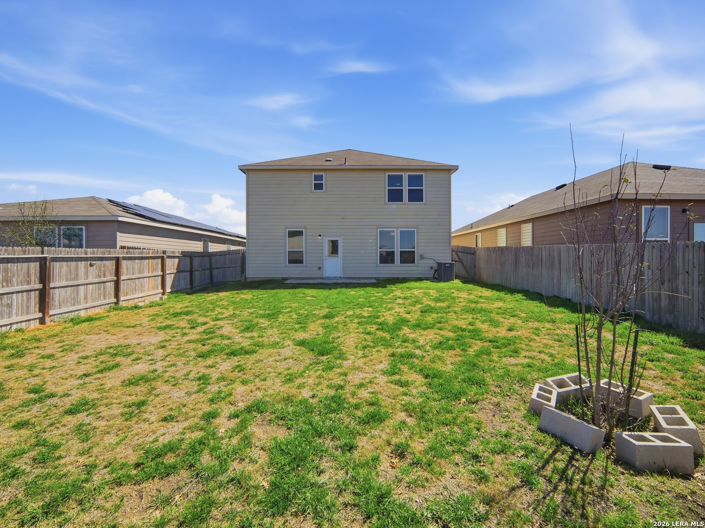 308 Autumn Rouge New Braunfels, TX 78130 - Photo 15 of 15 a backyard of a house with table and chairs