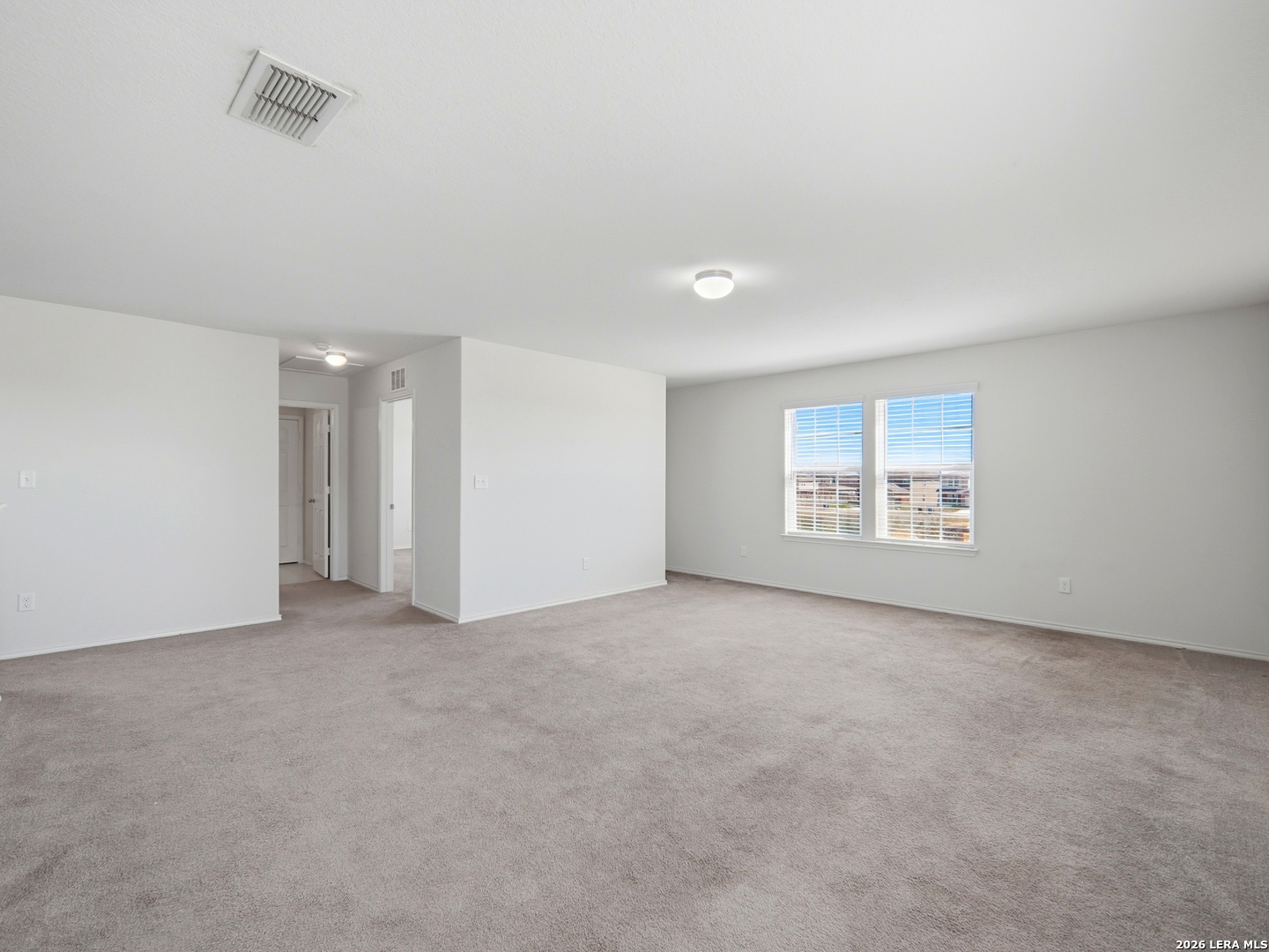 308 Autumn Rouge New Braunfels, TX 78130 - Photo 7 of 15 an empty room with a empty space and windows
