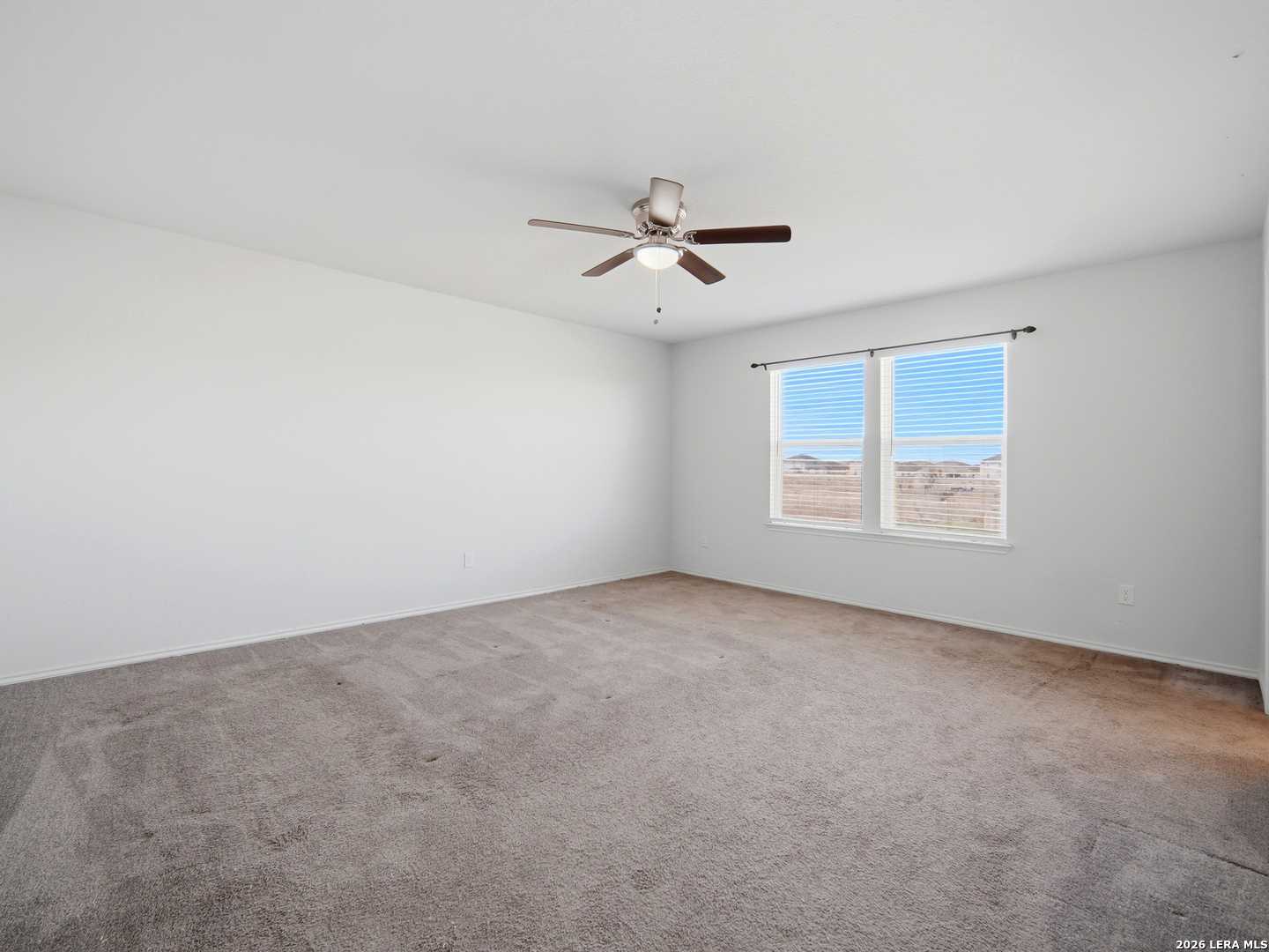 308 Autumn Rouge New Braunfels, TX 78130 - Photo 8 of 15 a view of an empty room with a window