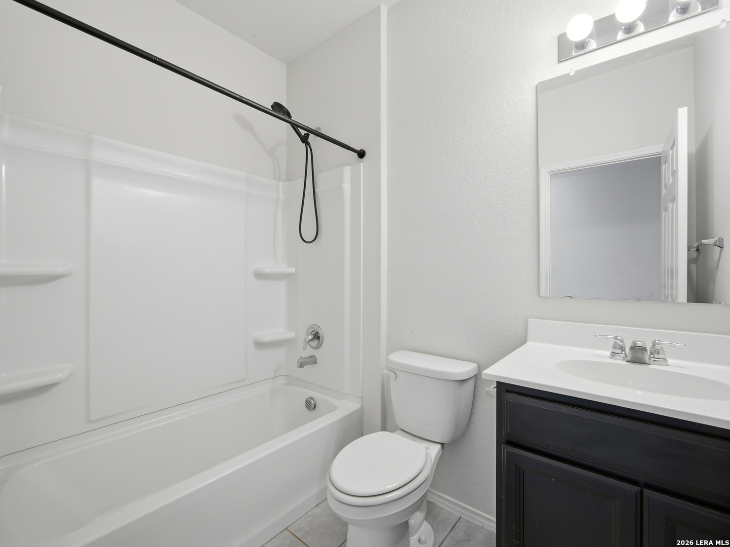 308 Autumn Rouge New Braunfels, TX 78130 - Photo 9 of 15 a bathroom with a sink a toilet and a bathtub