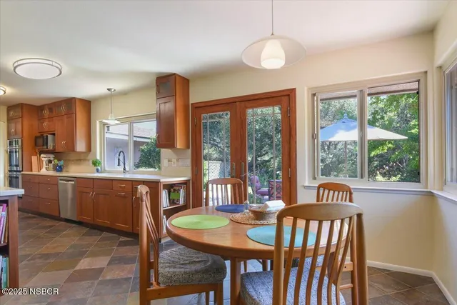 a living room with fireplace furniture and a flat screen tv