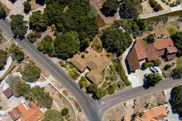 a view of a city with mountains in the background