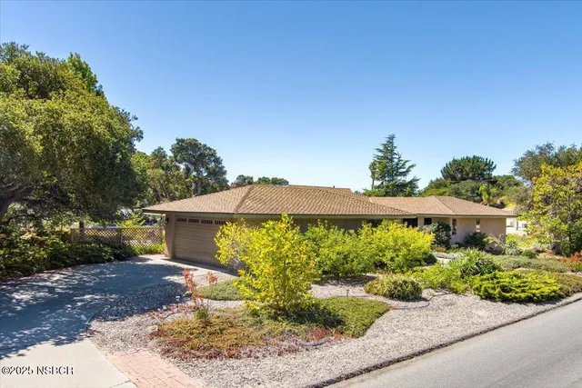 a view of a garden with a patio