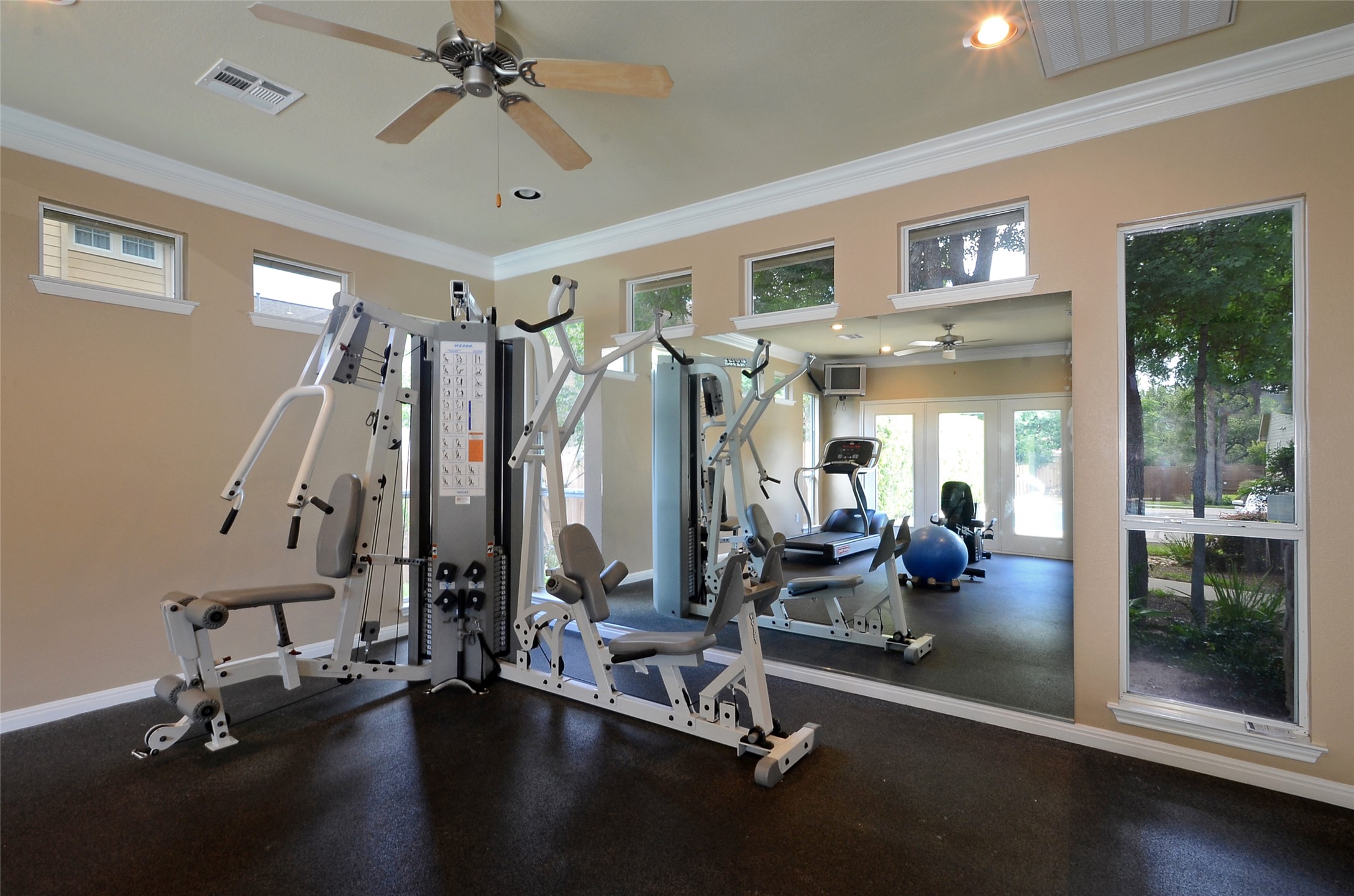 11000 Anderson Mill Road, Unit 45 Austin, TX 78750 - Photo 27 of 32 a view of a room with gym equipment