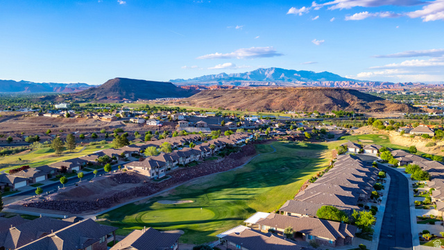 2212 Chippenham Court St. George, UT 84770 - Photo 54 of 75 Aerial view of residential area featuring mountains and a golf course