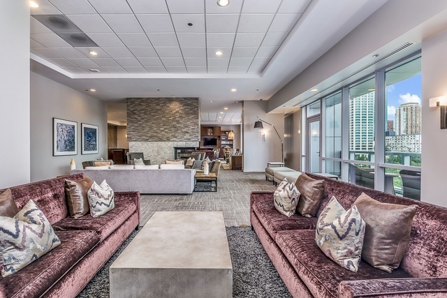 1201 South Prairie Avenue, Unit 3404 Chicago, IL 60605 - Photo 29 of 38 a living room with furniture and a large window