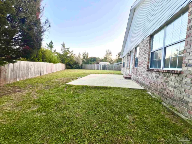 a view of a backyard with a garden
