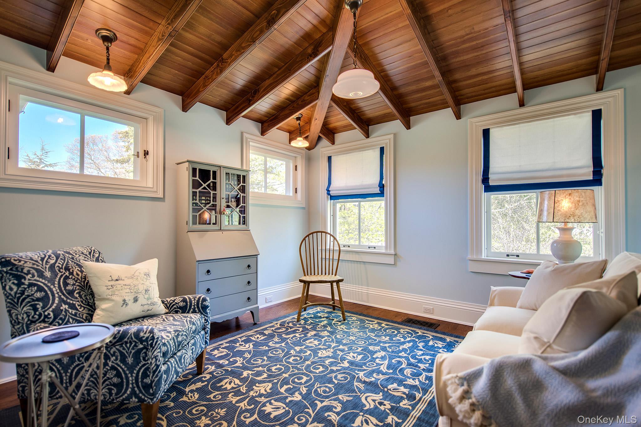 106 Old Depot Road Quogue, NY 11959 - Photo 16 of 34 a bedroom with furniture and a window