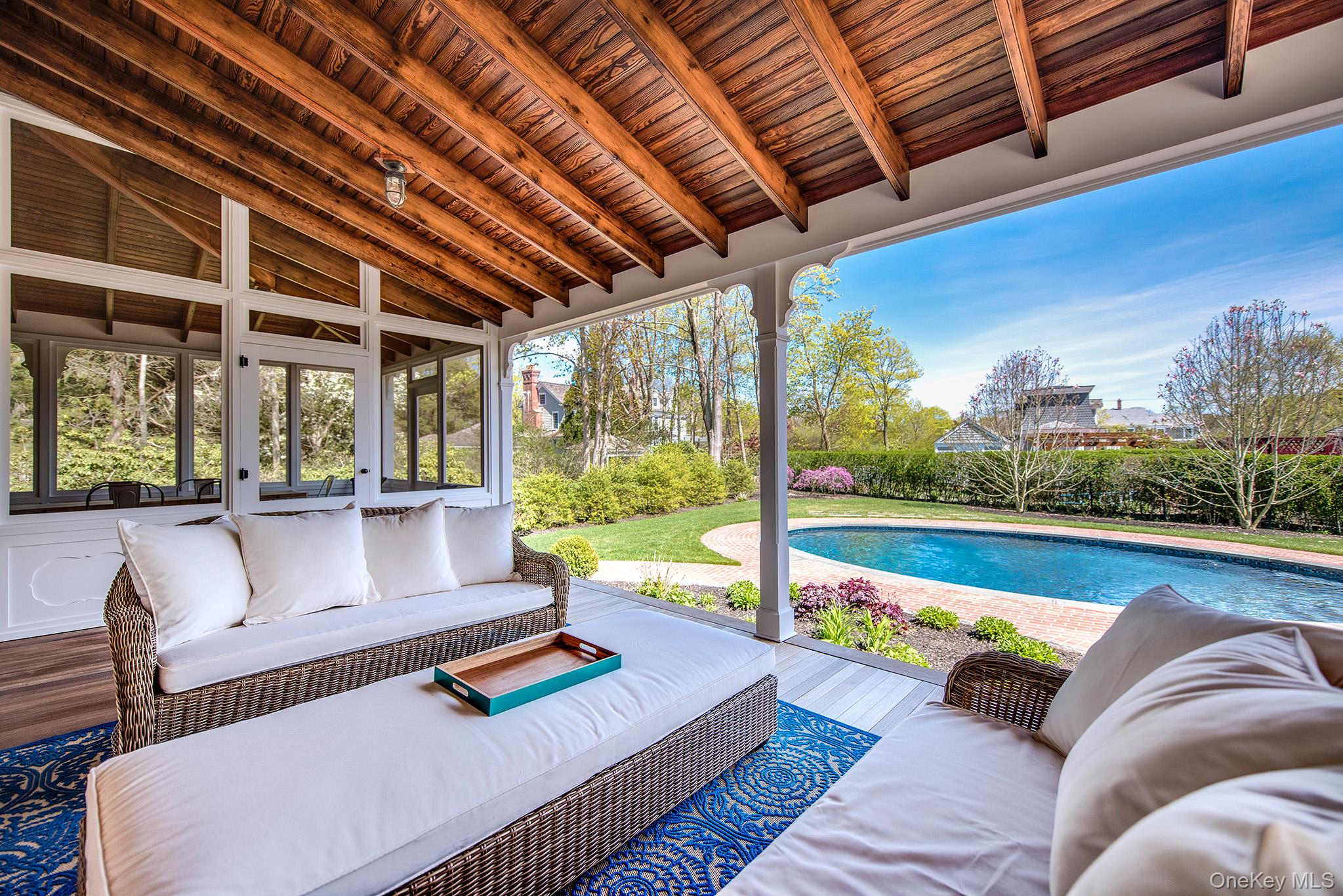 106 Old Depot Road Quogue, NY 11959 - Photo 4 of 34 a roof deck with couch and city view
