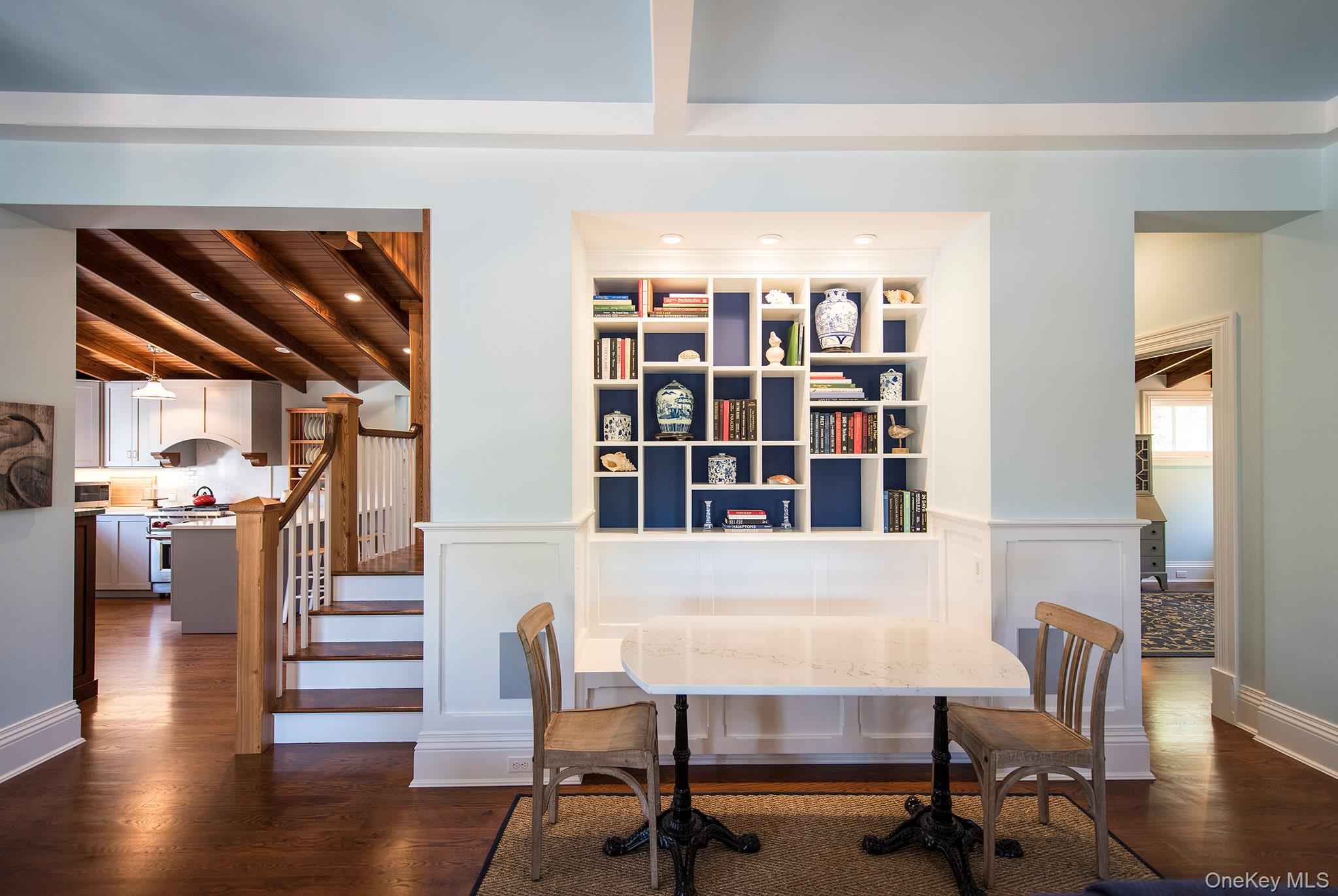 106 Old Depot Road Quogue, NY 11959 - Photo 9 of 34 a view of a livingroom with furniture and staircase