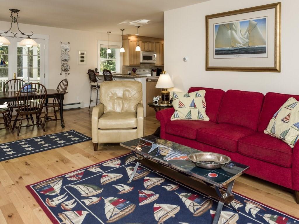 680 Ocean Point Road East Boothbay, ME 04544 - Photo 10 of 31 The living room is open with propane...