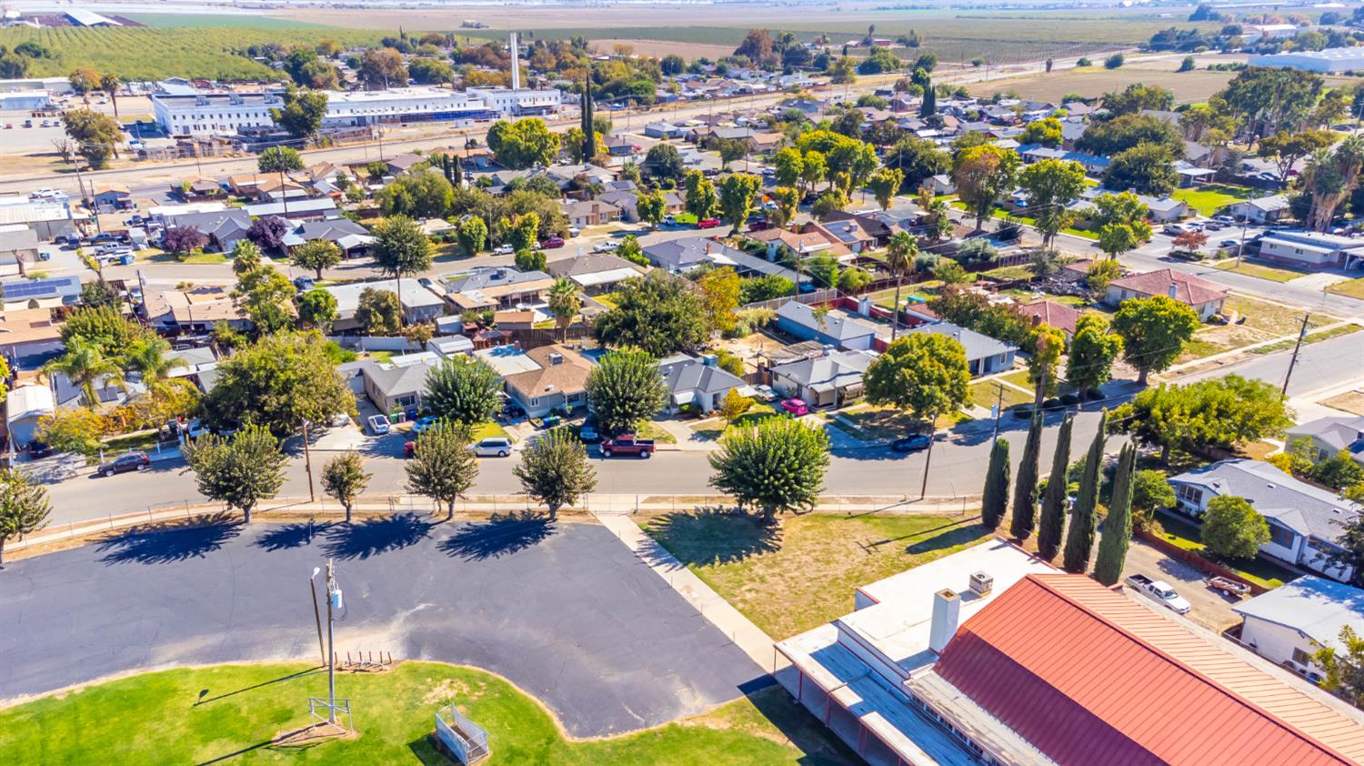 792 Grove Avenue Gustine, CA 95322 - Photo 28 of 32 an aerial view of a house with a swimming pool yard and outdoor seating