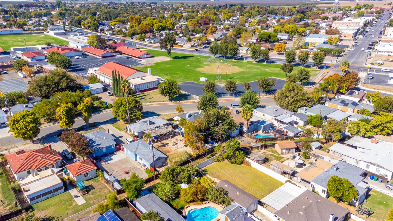 792 Grove Avenue Gustine, CA 95322 - Photo 30 of 32 an aerial view of residential houses with outdoor space