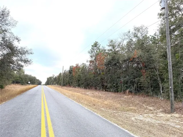 a view of a backyard with a mountain