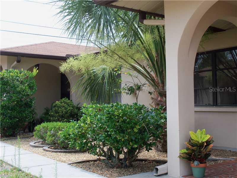 5402 James Street New Port Richey, FL 34652 - Photo 1 of 1 a front view of a house with a yard