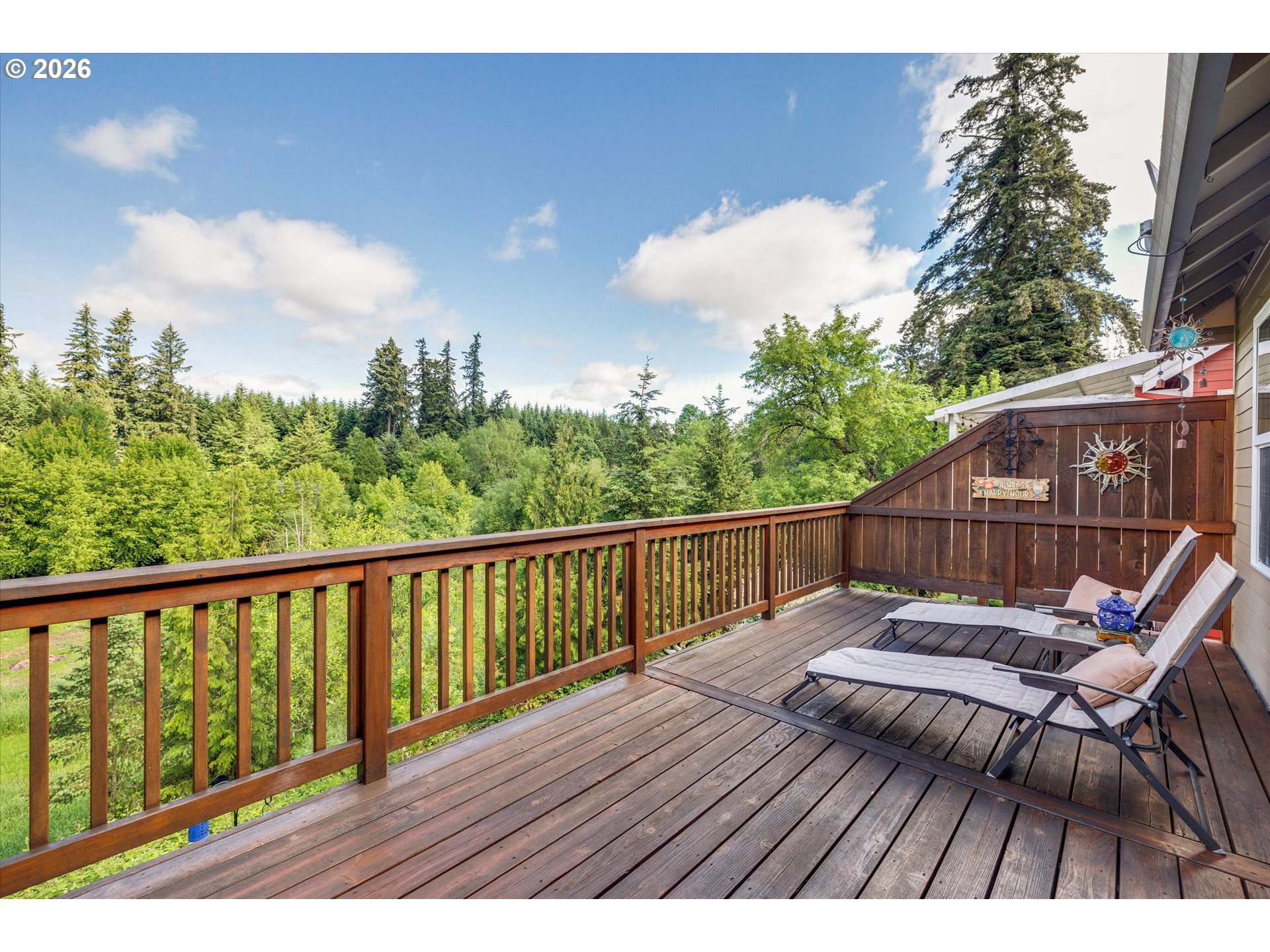 3769 10th Street Hubbard, OR 97032 - Photo 34 of 47 a view of balcony with wooden floor and seating space