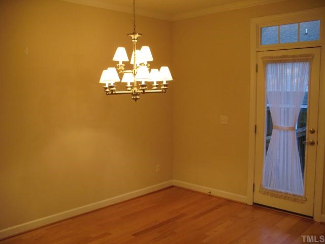 6102 Shandwick Court Raleigh, NC 27609 - Photo 5 of 10 Breakfast room with hardwood floors.
