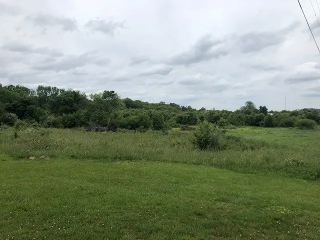 a view of an outdoor space and a yard