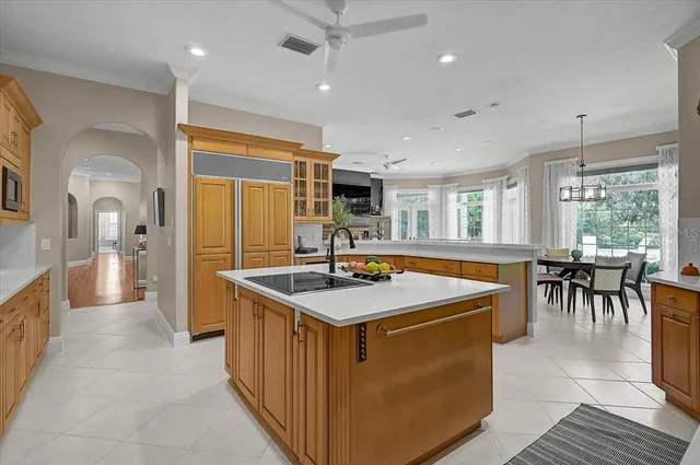a living room with fireplace furniture and a flat screen tv
