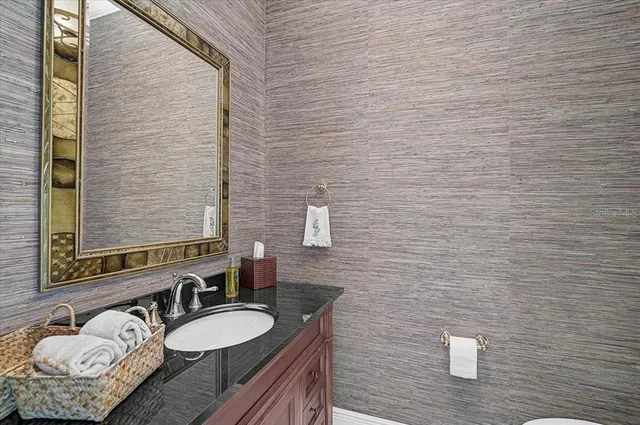 a living room with a large window and outer view