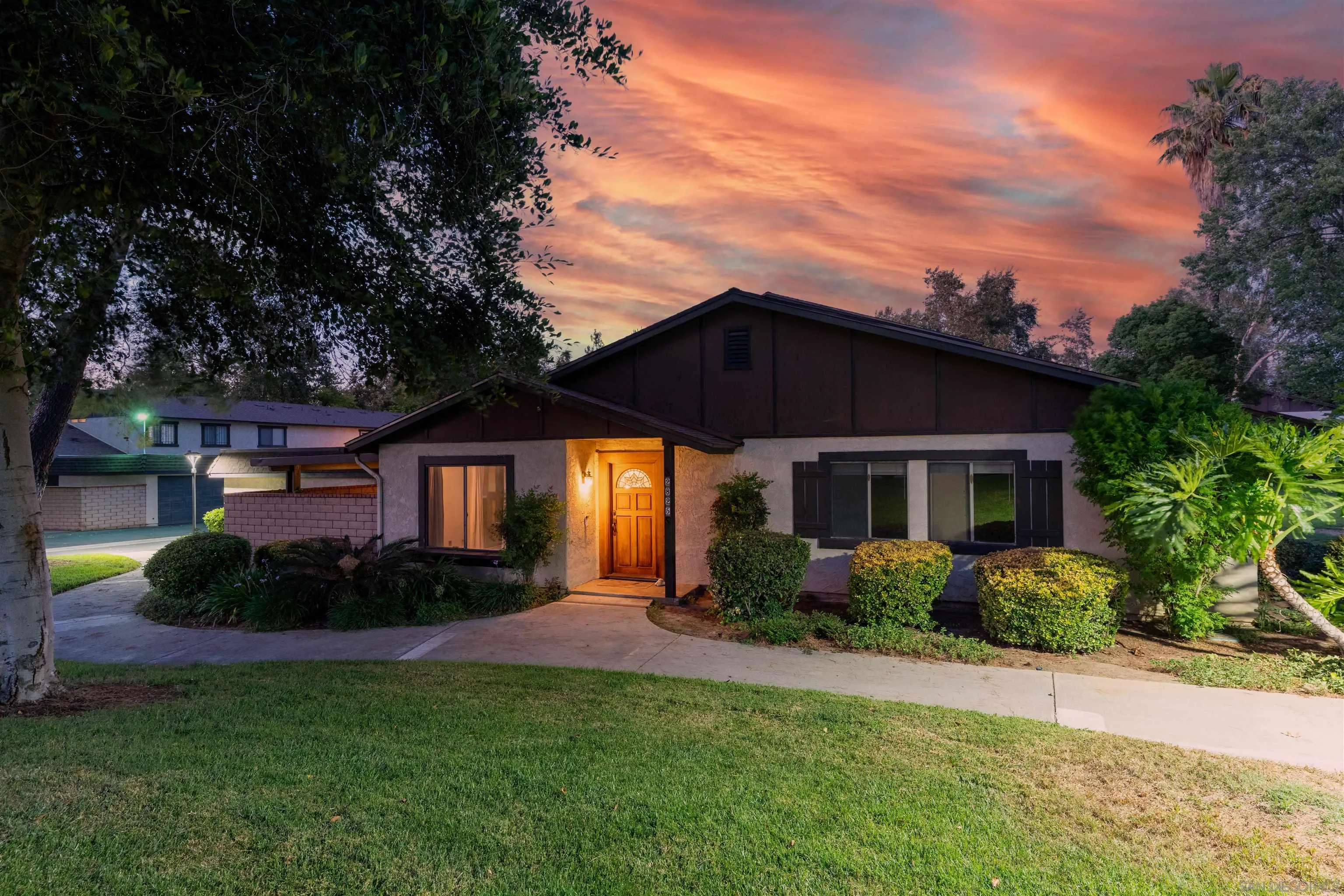 2825 Irving Street Riverside, CA 92504 - Photo 1 of 31 a front view of a house with a garden