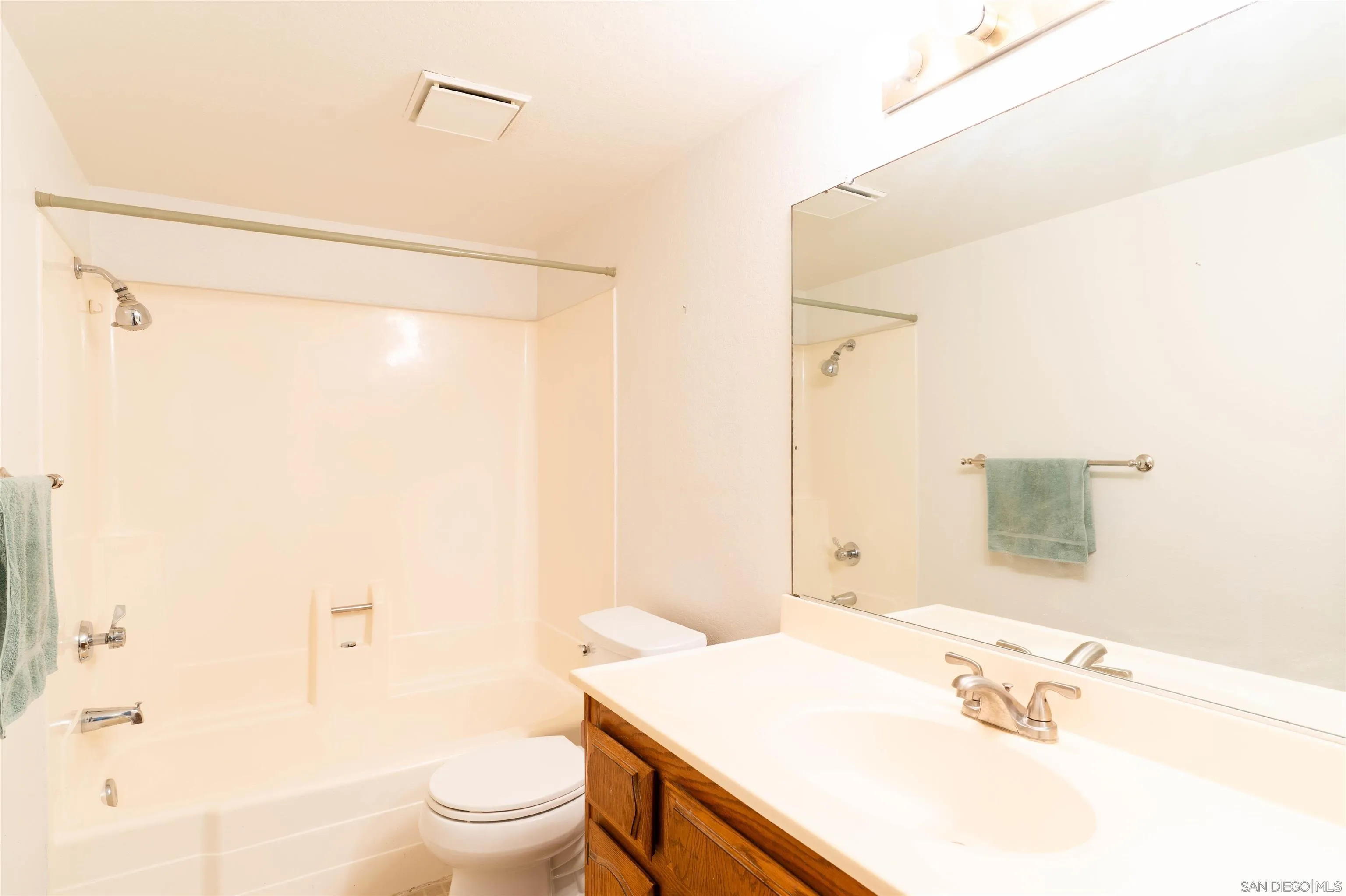 2825 Irving Street Riverside, CA 92504 - Photo 17 of 31 a bathroom with a sink toilet and shower