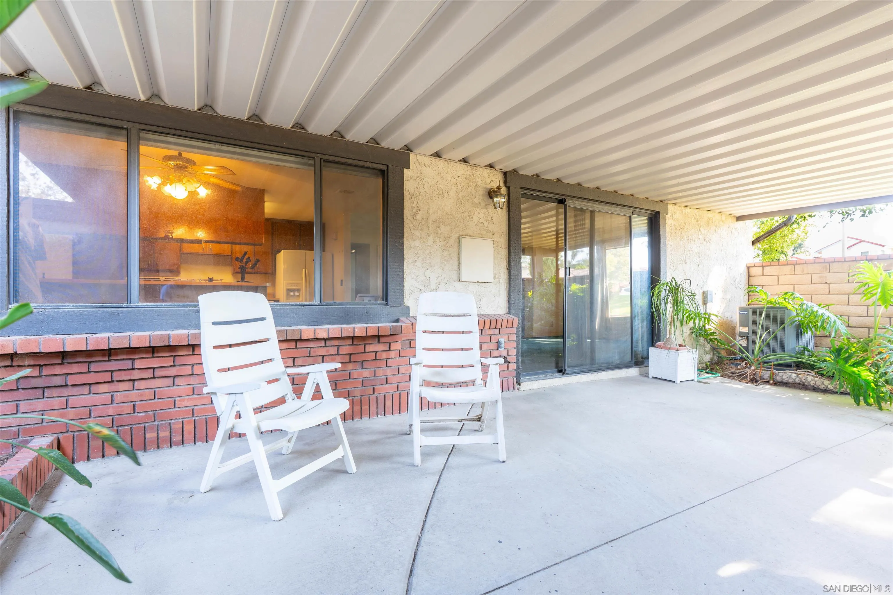 2825 Irving Street Riverside, CA 92504 - Photo 19 of 31 a balcony with furniture and outdoor view