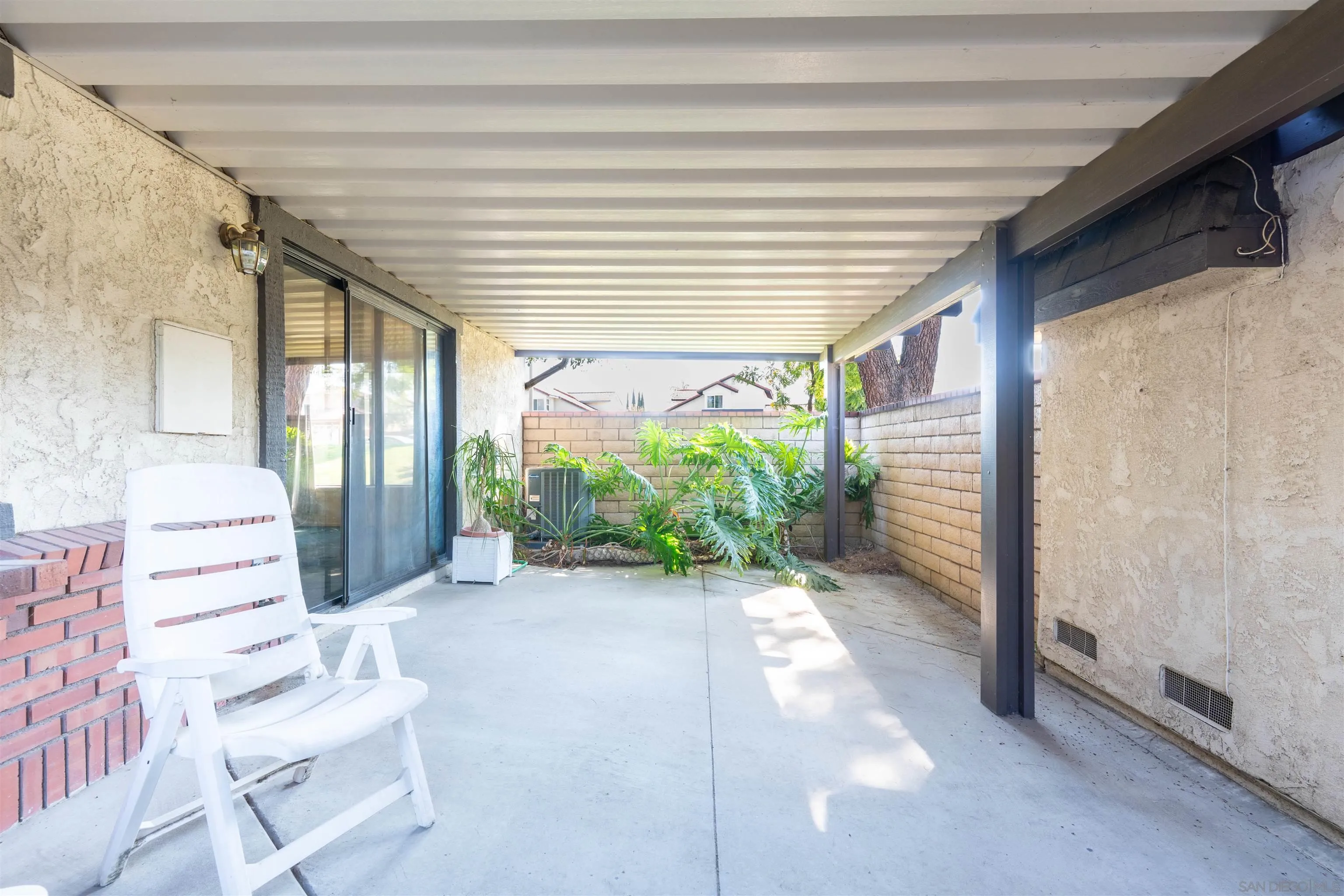 2825 Irving Street Riverside, CA 92504 - Photo 21 of 31 a view of front door with outdoor seating