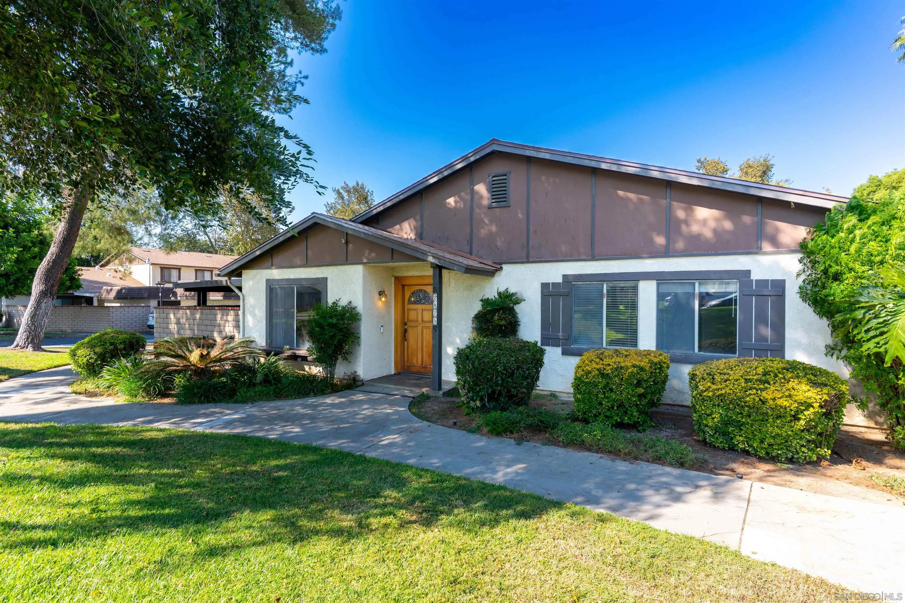 2825 Irving Street Riverside, CA 92504 - Photo 26 of 31 a front view of a house with a garden and plants