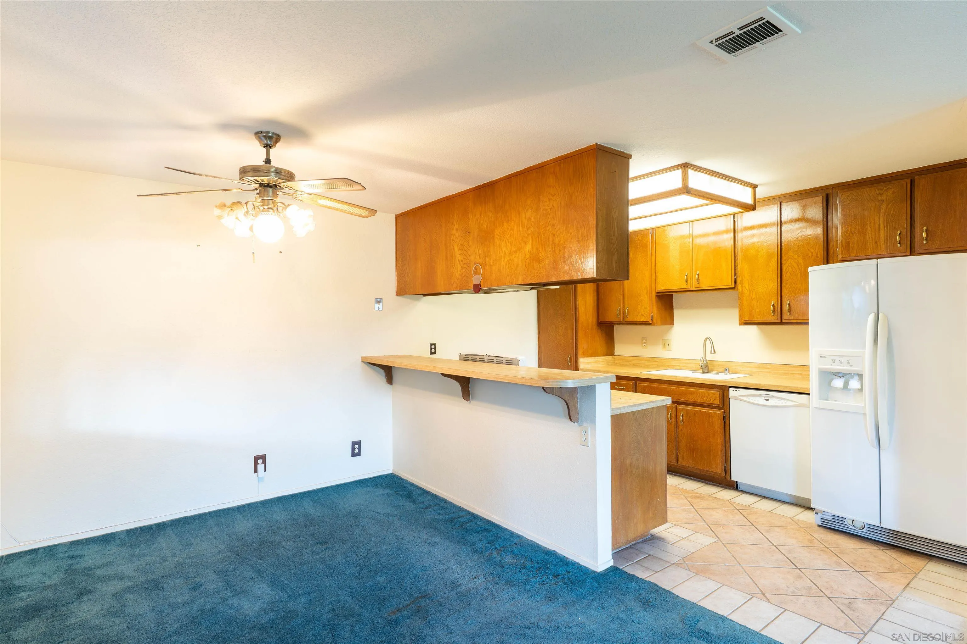 2825 Irving Street Riverside, CA 92504 - Photo 7 of 31 a kitchen with a sink appliances and cabinets