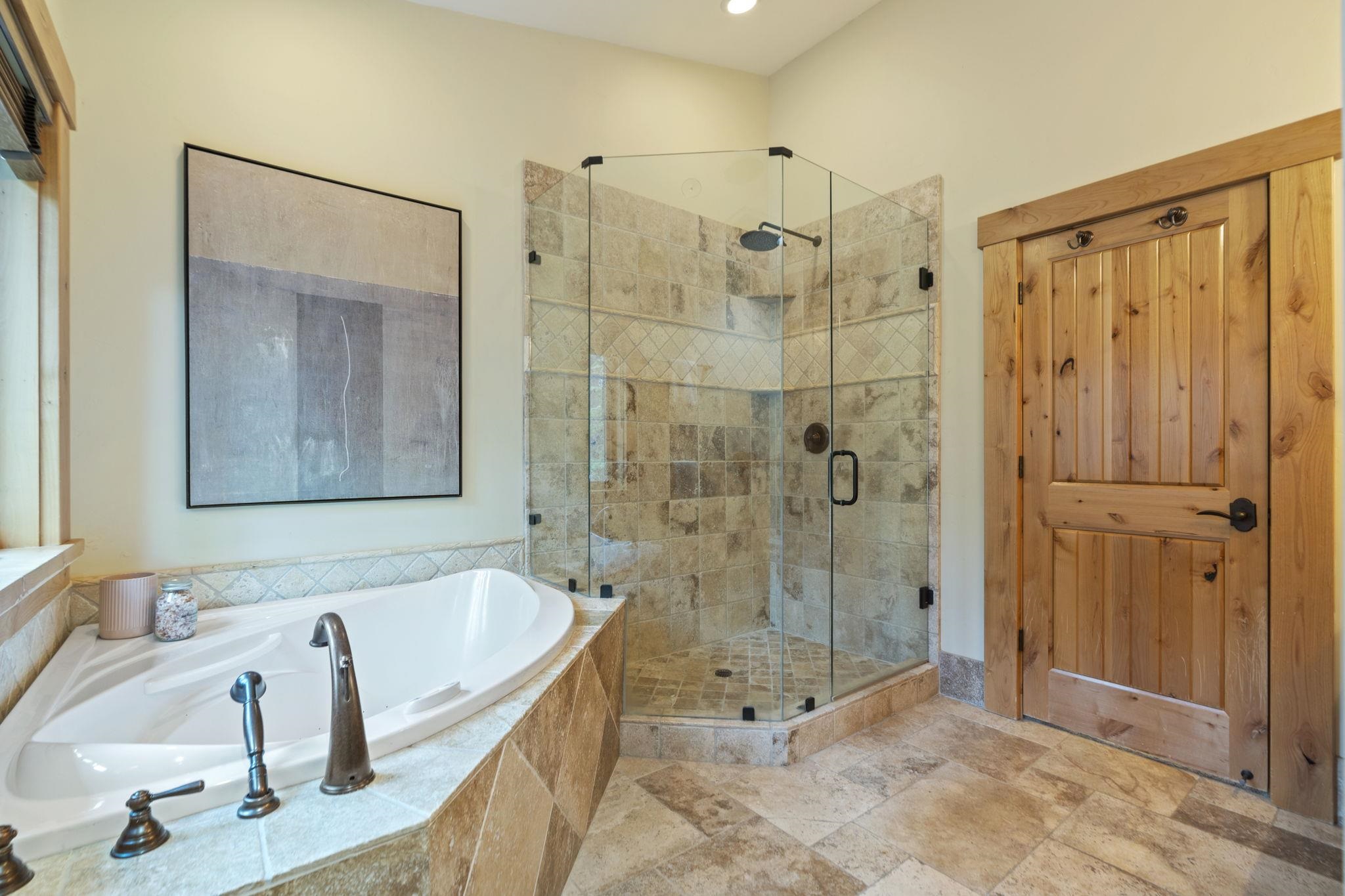 735 Cascade Circle Homewood, CA 96141 - Photo 14 of 21 a bathroom with a tub a sink and a shower