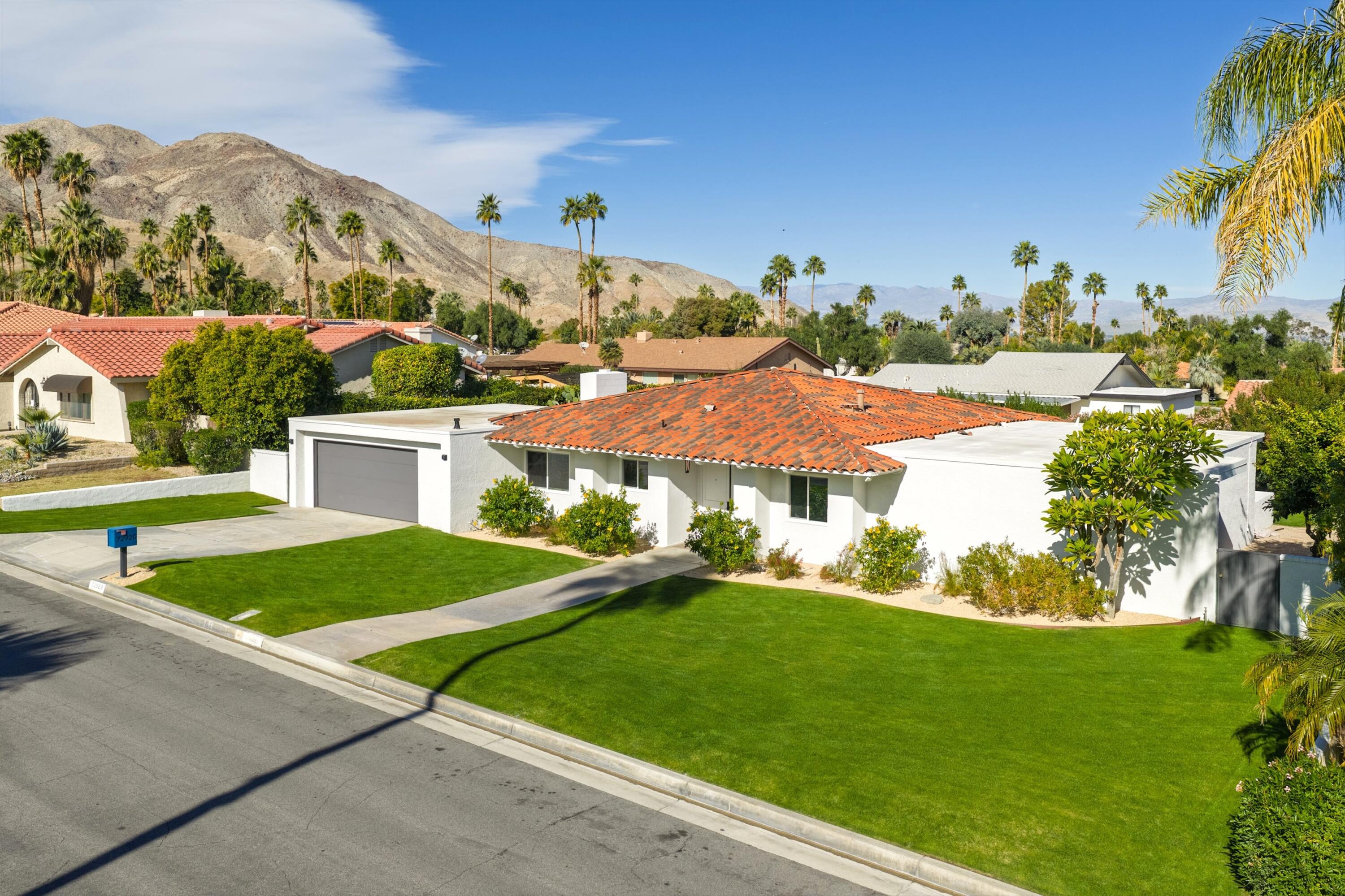 72920 Somera Road Palm Desert, CA 92260 - Photo 36 of 49 a view of outdoor space yard and swimming pool