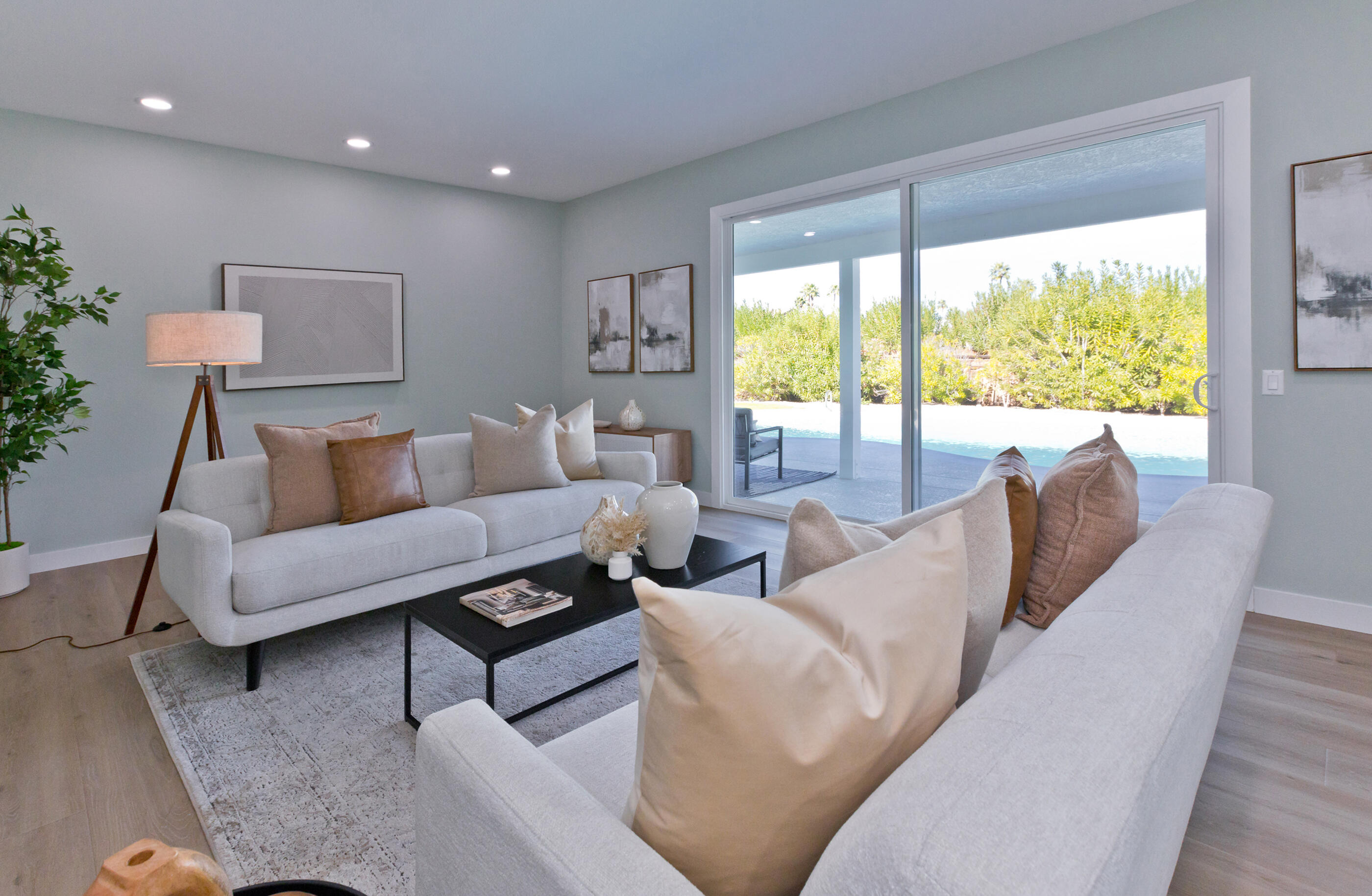 72920 Somera Road Palm Desert, CA 92260 - Photo 9 of 49 a living room with furniture and a large window