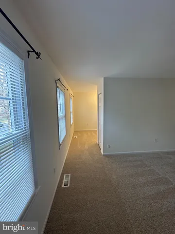 a view of an empty room with window