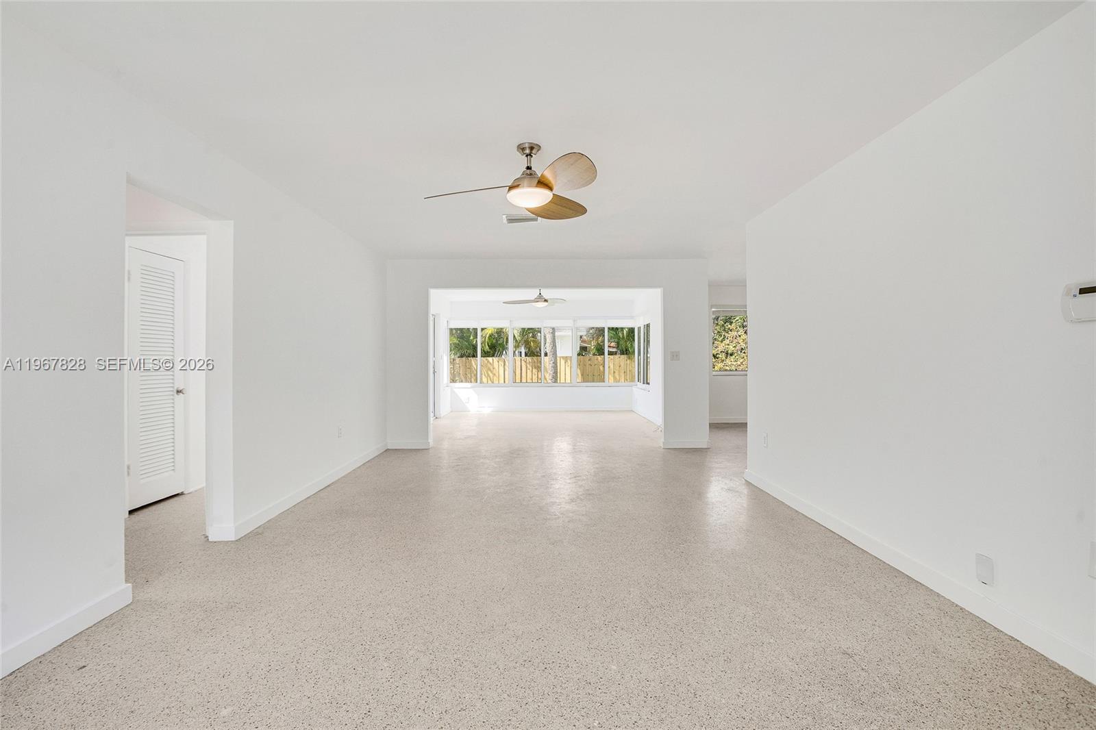 9372 Abbott Avenue Surfside, FL 33154 - Photo 3 of 25 a view of an empty room and window