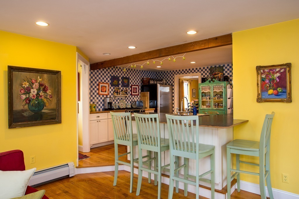 41 Magnolia Road Milton, MA 02186 - Photo 11 of 25 a view of a dining room with furniture