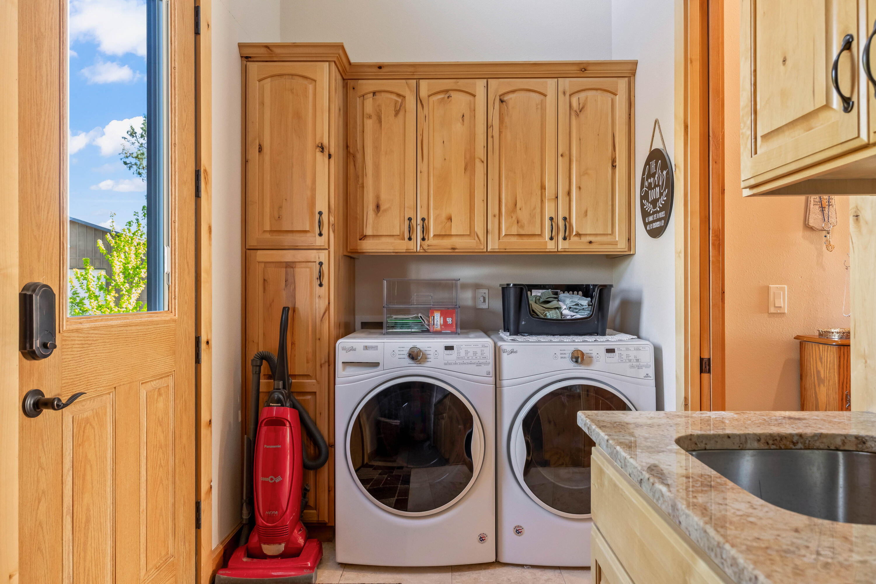 70030 Northwest Hunt Road Sisters, OR 97759 - Photo 20 of 55 a utility room with dryer and washer