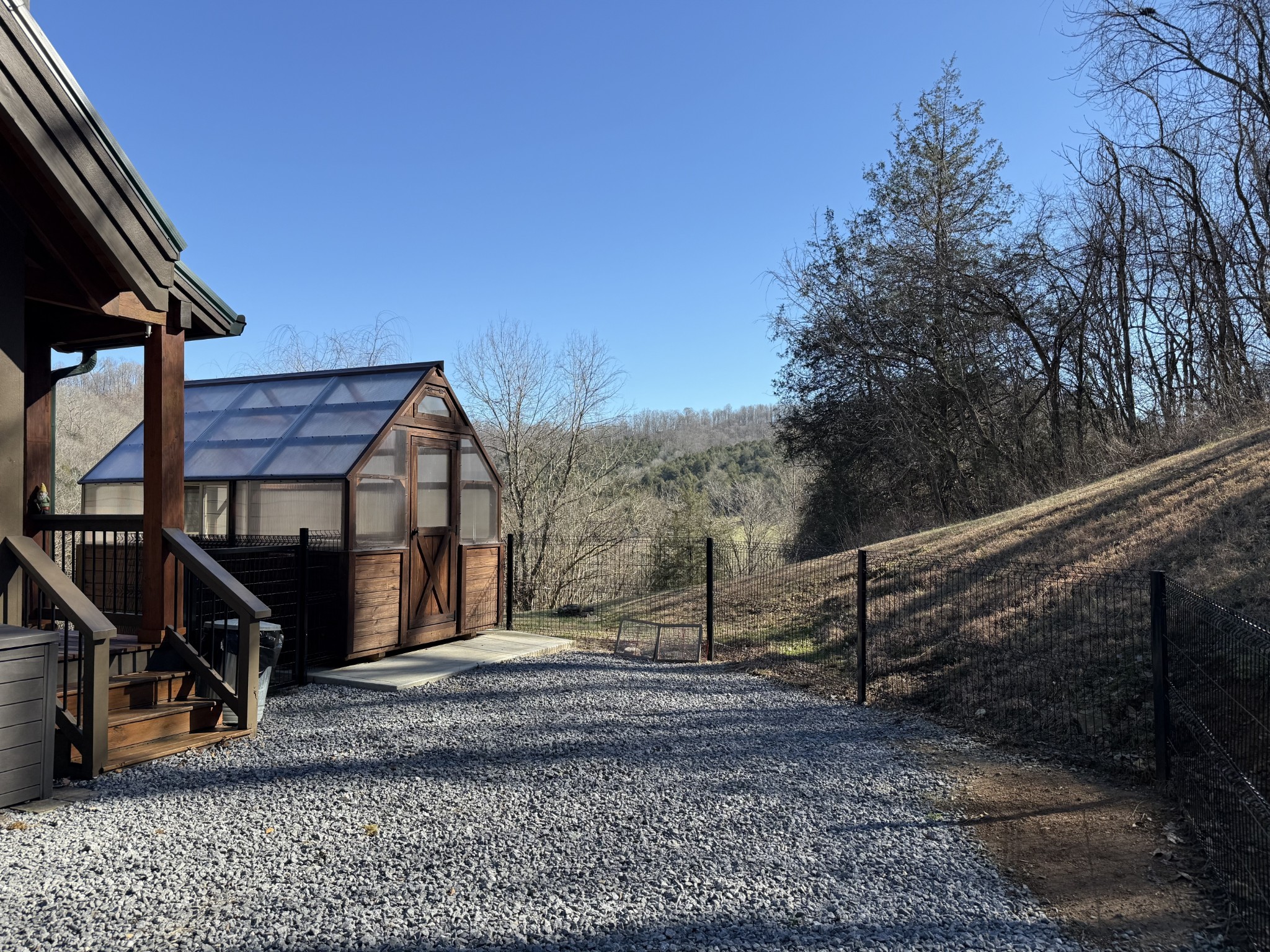 575 East Fork Road Whitleyville, TN 38588 - Photo 19 of 45 a view of a house with a small yard
