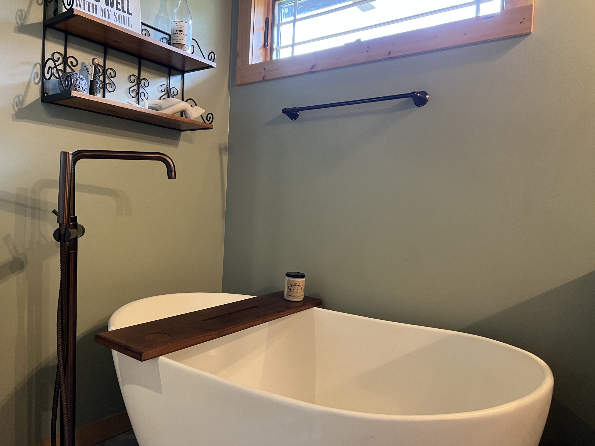 575 East Fork Road Whitleyville, TN 38588 - Photo 21 of 45 a bathroom with a white bath tub and a window