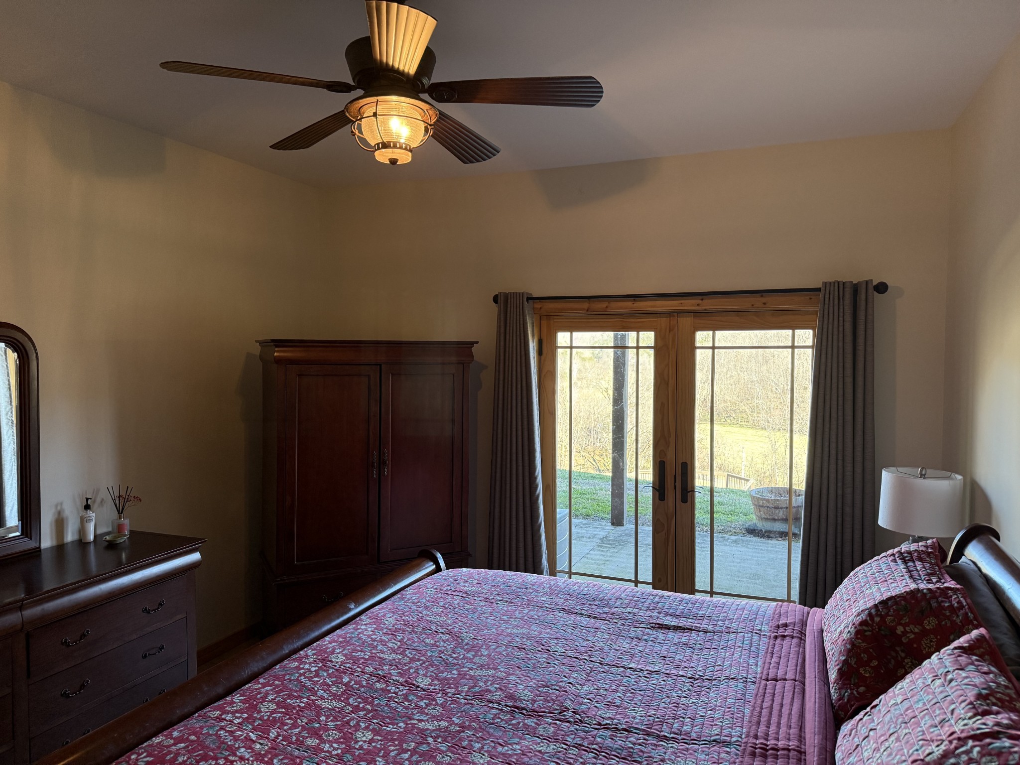 575 East Fork Road Whitleyville, TN 38588 - Photo 30 of 45 a bedroom with a bed and a chandelier
