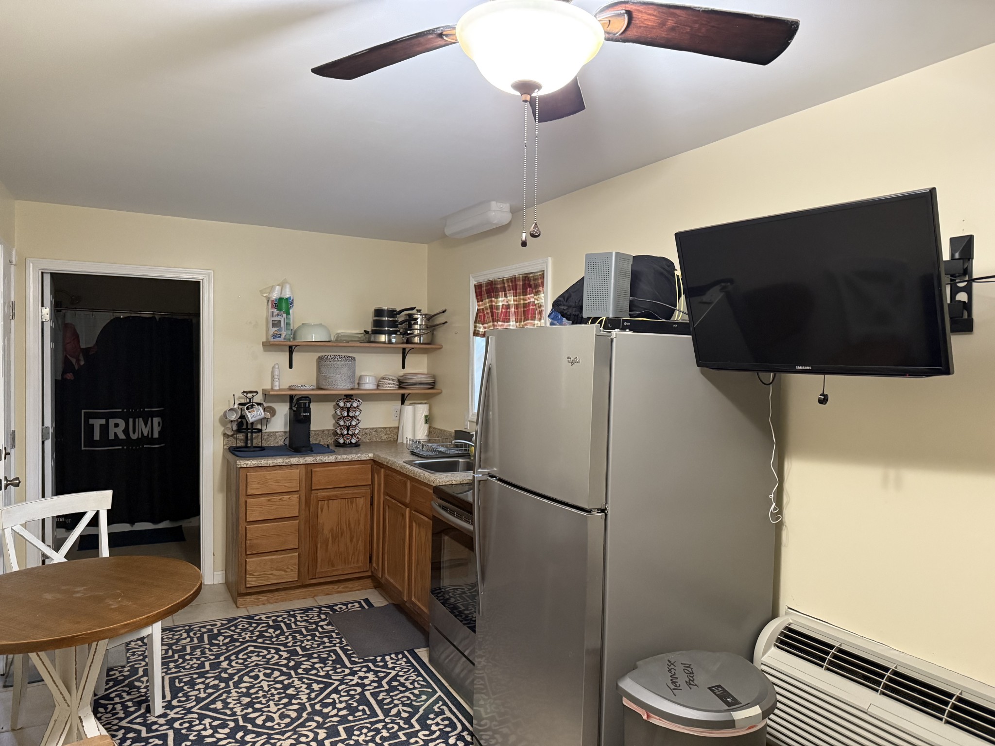 575 East Fork Road Whitleyville, TN 38588 - Photo 42 of 45 a kitchen with a refrigerator a stove a microwave and cabinets