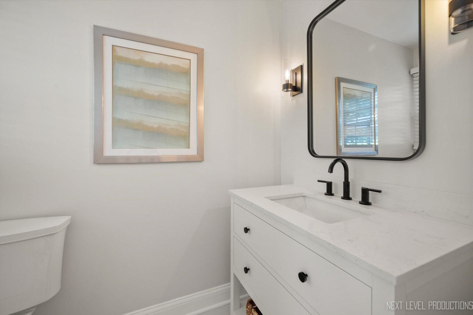 Undisclosed Address Geneva, IL 60134 - Photo 7 of 10 a bathroom with a sink and a mirror