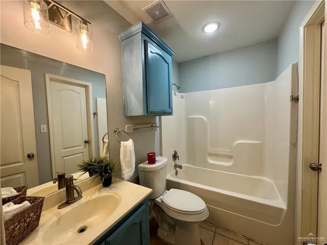 a view of a livingroom with furniture and window