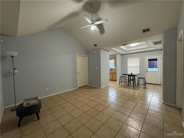 a view of a house with backyard