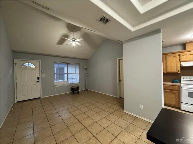 a view of a livingroom with furniture and cabinets