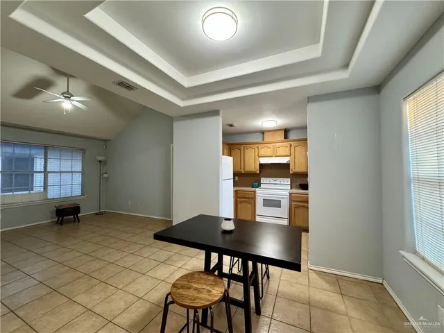 a view of a kitchen with a sink