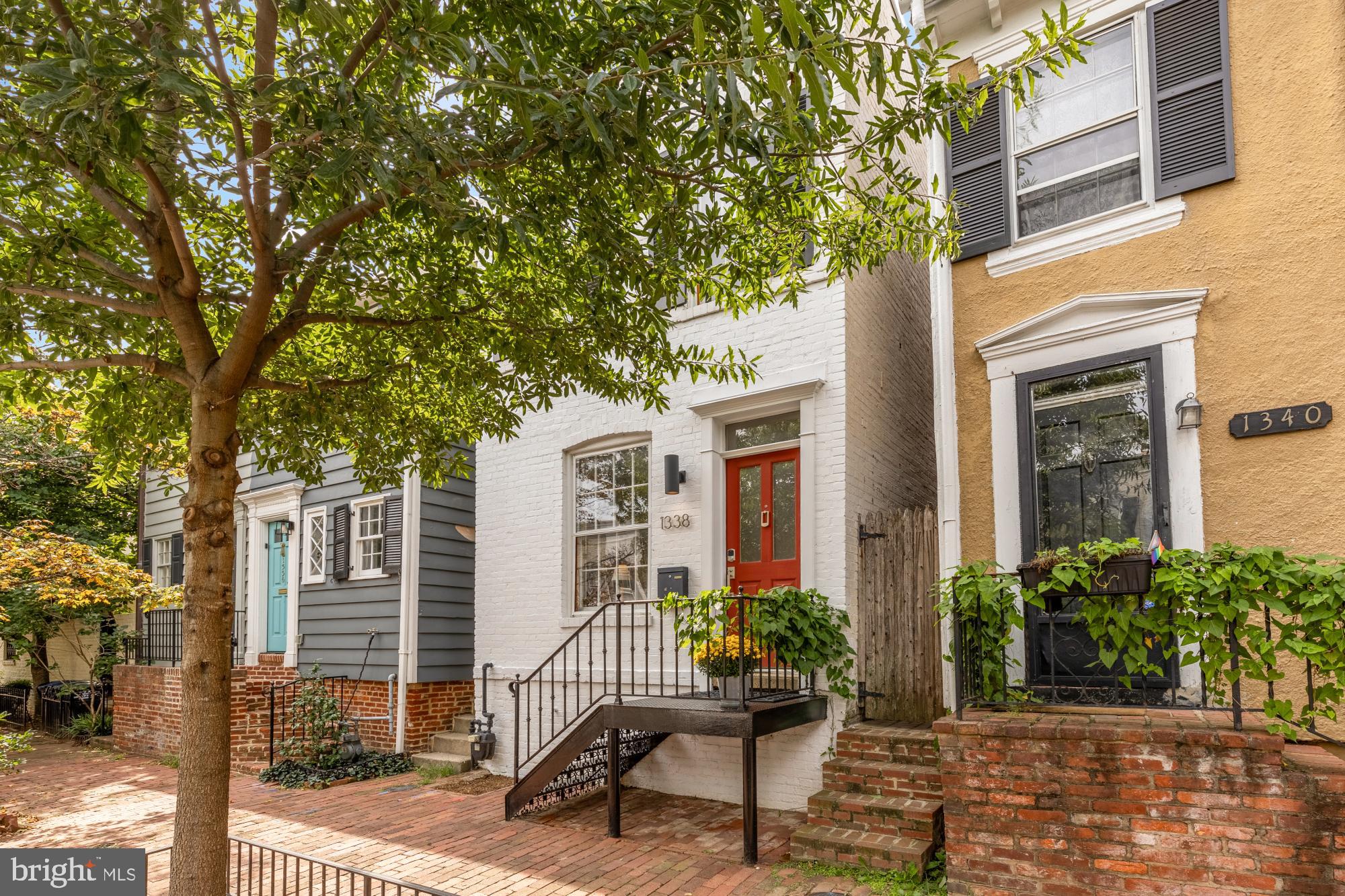 1338 28th Street Northwest Washington, DC 20007 - Photo 3 of 39 a view of a house with backyard and sitting area