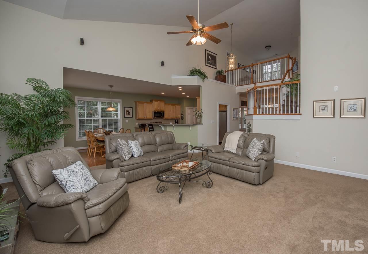 4424 Fairview Ridge Lane Apex, NC 27539 - Photo 11 of 25 Open to breakfast area and kitchen -- lots of windows