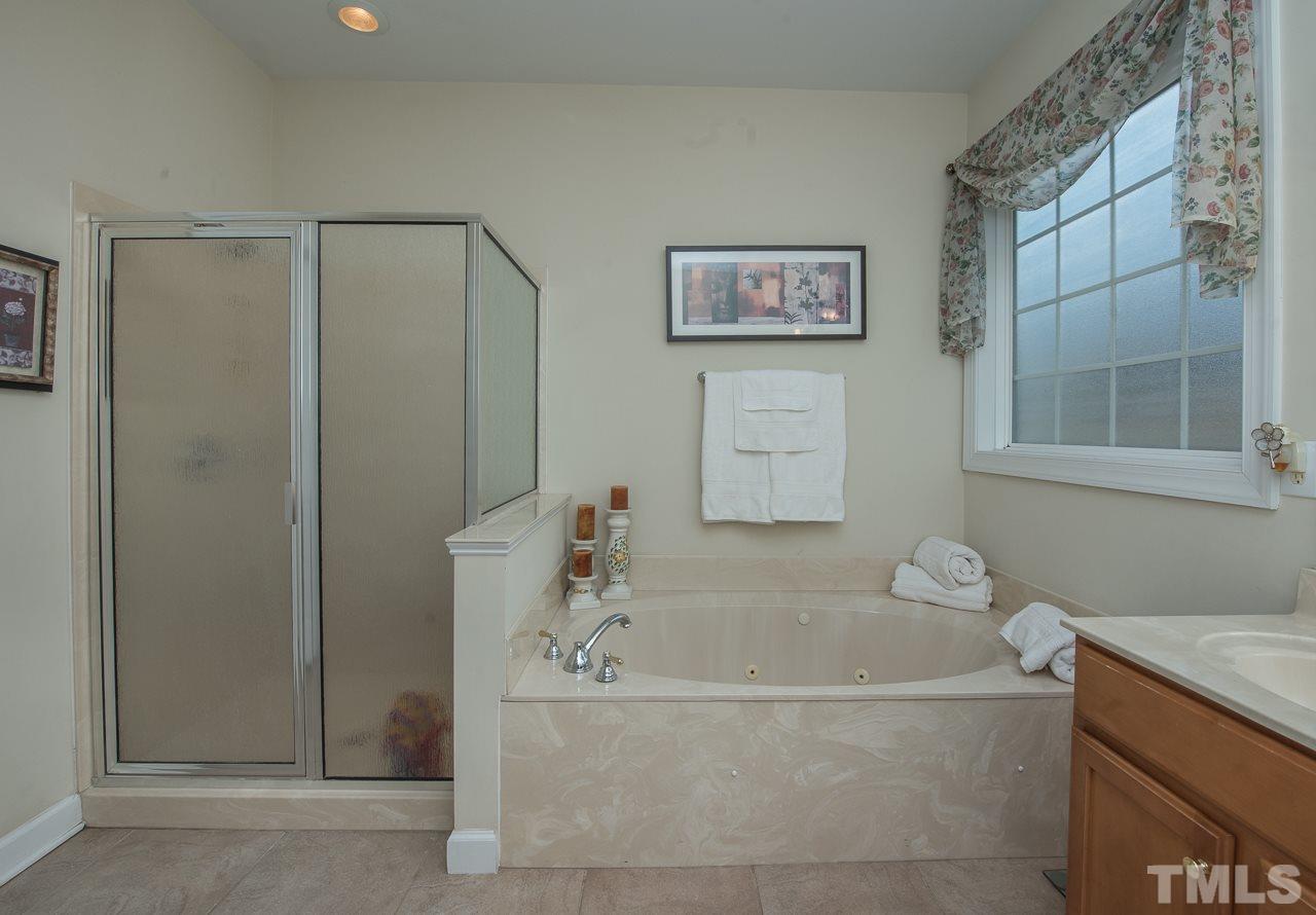 4424 Fairview Ridge Lane Apex, NC 27539 - Photo 14 of 25 Jetted garden tub and separate stall shower